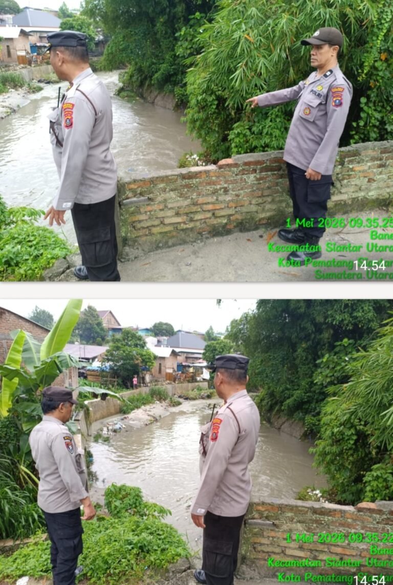 Polsek Siantar Utara Pantau Arus Sungai di Lorong 7 Antisipasi Banjir