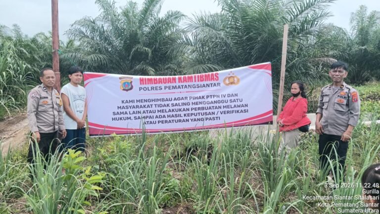 Polsek Siantar Martoba Pemasangan Spanduk Himbauan Kamtibmas di Gurilla Kebun Bangun